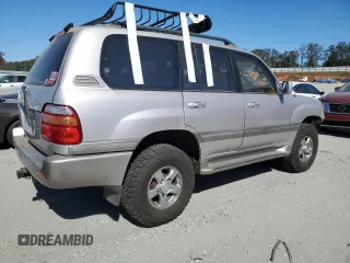 2002 Toyota Land Cruiser with VIN JTEHT05J122027769, listed as a Copart auction lot 76518004 with 151,767 mi miles and Salvage Title. Bid and sale history available at carsss.com. Image 3.