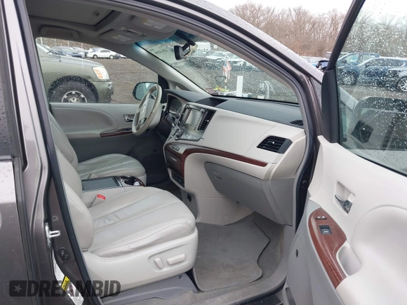 2012 Toyota Sienna XLE with VIN 5TDDK3DC7CS035444, listed as a IAAI auction lot 41640499 with 117,220 mi miles and . Bid and sale history available at DreamBid. Image 5.