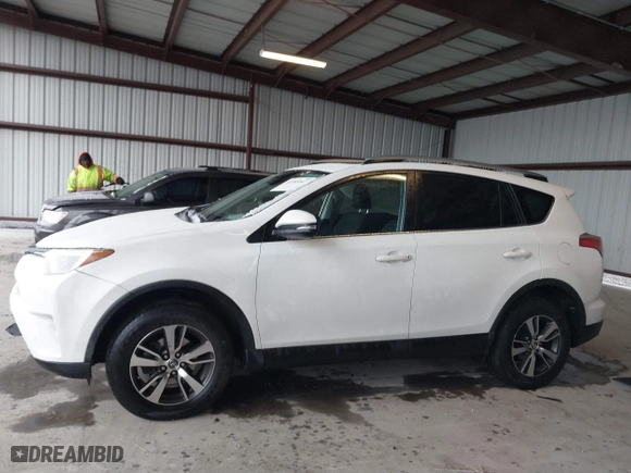 2018 Toyota RAV4 XLE with VIN JTMRFREV6JD222115, listed as a IAAI auction lot 41505367 with 118,126 mi miles. Bid and sale history available at carsss.com. Image 14.