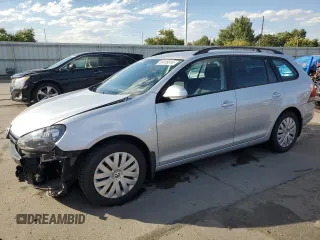 2014 Volkswagen Jetta S with VIN 3VWKP7AJ5EM617030, listed as a Copart auction lot 69189244 with 36,602 mi miles and Salvage title. Bid and sale history available at DreamBid. Image 1.