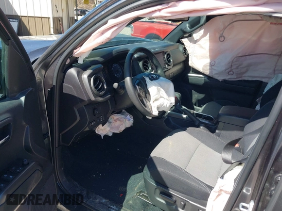 2023 Toyota Tacoma SR5 z VIN 3TMDZ5BN1PM163714, wystawiony jako IAAI lot #41814446 z przebiegiem 14 069 mil mil oraz . Historia ofert i sprzedaży dostępna na DreamBid. Obrazek 5.