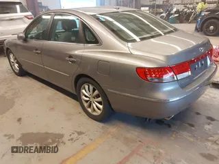 2007 Hyundai Azera SE with VIN KMHFC46F07A243229, listed as a IAAI auction lot 41261394 with 249,523 mi miles and . Bid and sale history available at DreamBid. Image 3.