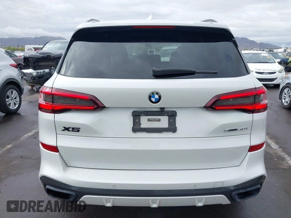2020 BMW X5 sDrive40i with VIN 5UXCR4C04L9D41635, listed as a IAAI auction lot 42201174 with 64,989 mi miles and . Bid and sale history available at DreamBid. Image 16.