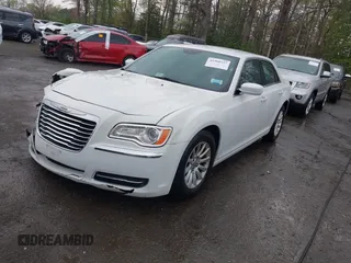 2014 Chrysler 300 with VIN 2C3CCAAG5EH128036, listed as a IAAI auction lot 41988327 with 153,809 mi miles. Bid and sale history available at carsss.com. Image 17.