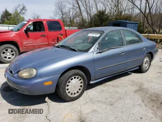 1999 Mercury Sable GS with VIN 1MEFM50U1XA653292, listed as a Copart auction lot 51307905 with 210,945 mi miles and Salvage Title. Bid and sale history available at carsss.com. Image 1.