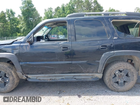2003 Chevrolet Tahoe Z71 with VIN 1GNEK13ZX3R283921, listed as a IAAI auction lot 42347317 with 224,885 mi miles and . Bid and sale history available at DreamBid. Image 14.