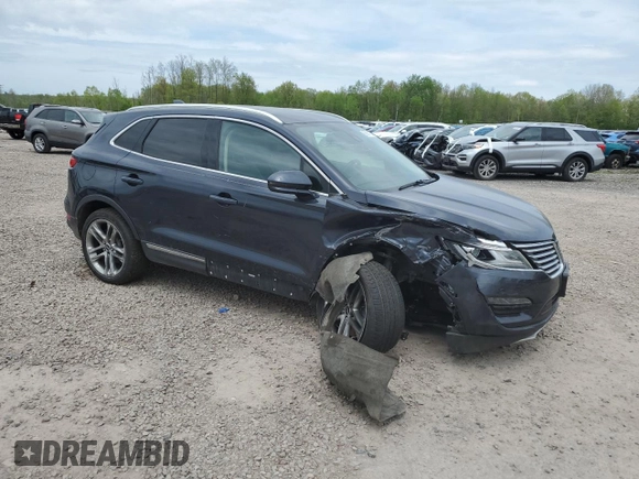 2015 Lincoln MKC z VIN 5LMTJ2AH9FUJ03616, wystawiony jako Copart lot #56681155 z przebiegiem 95 055 mil mil oraz Szkoda całkowita • Salvage title. Historia ofert i sprzedaży dostępna na DreamBid. Obrazek 4.