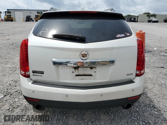 2014 Cadillac SRX Premium Collection z VIN 3GYFNDE37ES652548, wystawiony jako Copart lot #65895833 z przebiegiem 151 653 mil mil oraz Szkoda całkowita • Salvage title. Historia ofert i sprzedaży dostępna na DreamBid. Obrazek 6.