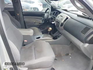 2009 Toyota Tacoma with VIN 3TMLU42N69M032320, listed as a IAAI auction lot 42280196 with 214,720 mi miles and . Bid and sale history available at DreamBid. Image 5.