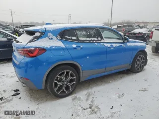 2021 BMW X2 xDrive28i with VIN WBXYJ1C05M5S44997, listed as a Copart auction lot 83067164 with 33,067 mi miles and Salvage Title. Bid and sale history available at carsss.com. Image 3.