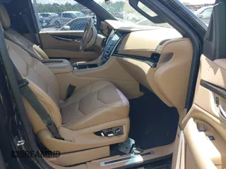 2019 Cadillac Escalade Platinum with VIN 1GYS4DKJ9KR138333, listed as a IAAI auction lot 42523430 with 104,787 mi miles and . Bid and sale history available at DreamBid. Image 5.