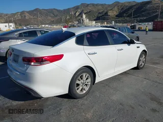 2016 Kia Optima LX z VIN 5XXGT4L34GG049312, wystawiony jako IAAI lot #41890581 z przebiegiem 142 360 mil mil oraz . Historia ofert i sprzedaży dostępna na DreamBid. Obrazek 4.