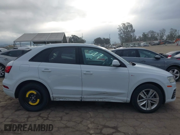 2018 Audi Q3 Premium z VIN WA1BCCFSXJR028356, wystawiony jako IAAI lot #41761544 z przebiegiem 82 877 mil mil oraz . Historia ofert i sprzedaży dostępna na DreamBid. Obrazek 14.