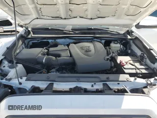 2021 Toyota Tacoma SR z VIN 3TMCZ5AN8MM387166, wystawiony jako Copart lot #49952935 z przebiegiem 63 175 mil mil oraz Szkoda całkowita • Salvage title. Historia ofert i sprzedaży dostępna na DreamBid. Obrazek 11.