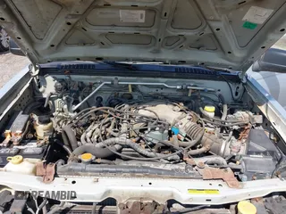 2001 Nissan Frontier SE Desert Runner z VIN 1N6ED26T61C303868, wystawiony jako IAAI lot #42698412 z przebiegiem 223 551 mil mil oraz . Historia ofert i sprzedaży dostępna na DreamBid. Obrazek 10.