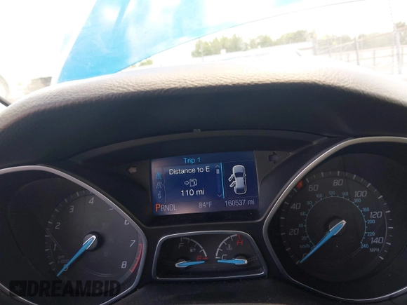 2013 Ford Focus SE z VIN 1FADP3F29DL300041, wystawiony jako IAAI lot #42361903 z przebiegiem 160 537 mil mil oraz . Historia ofert i sprzedaży dostępna na DreamBid. Obrazek 7.