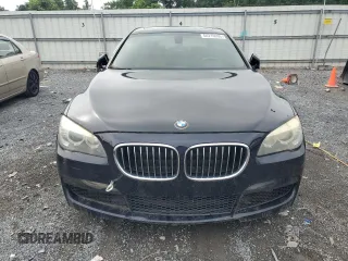 2014 BMW 7 Series 740Li xDrive with VIN WBAYF4C55ED281791, listed as a Copart auction lot 64210005 with 154,365 mi miles and Clean title. Bid and sale history available at DreamBid. Image 5.