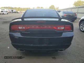 2013 Dodge Charger SE with VIN 2C3CDXBG9DH512172, listed as a Copart auction lot 60943214 with 125,163 mi miles and Salvage Title. Bid and sale history available at DreamBid. Image 6.