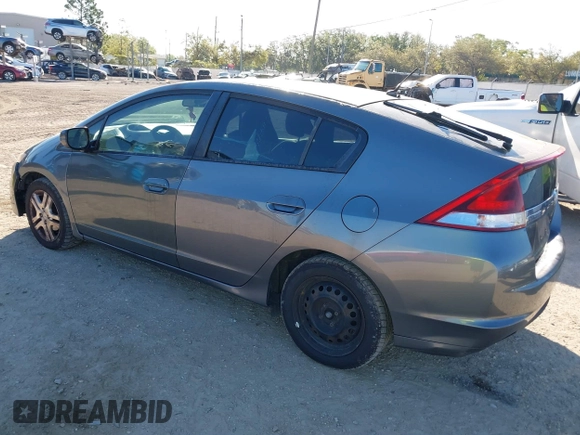 2012 Honda Insight LX with VIN JHMZE2H51CS003694, listed as a IAAI auction lot 41781384 with 154,685 mi miles and . Bid and sale history available at DreamBid. Image 3.