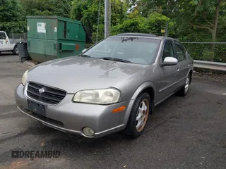 2001 Nissan Maxima SE z VIN JN1CA31D61T830594, wystawiony jako IAAI lot #42283716 z przebiegiem 218 155 mil mil oraz . Historia ofert i sprzedaży dostępna na DreamBid. Obrazek 2.