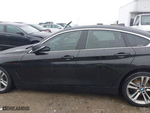 2019 BMW 4 Series 430i with VIN WBA4J1C55KBM16738, listed as a IAAI auction lot 41559766 with 103,258 mi miles. Bid and sale history available at carsss.com. Image 14.