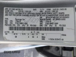 2012 Ford Fiesta SE with VIN 3FADP4BJ2CM150953, listed as a IAAI auction lot 42010904 with 77,637 mi miles. Bid and sale history available at carsss.com. Image 9.