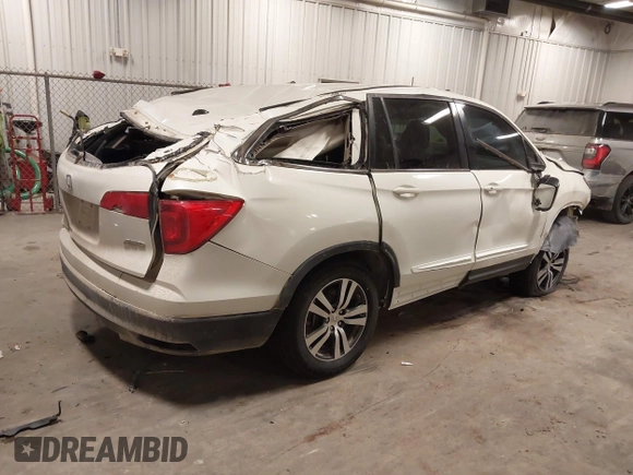 2016 Honda Pilot EX-L with VIN 5FNYF6H79GB019440, listed as a IAAI auction lot 41375747 with 199,535 mi miles. Bid and sale history available at carsss.com. Image 4.