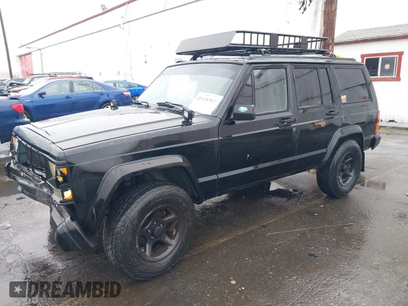 1996 Jeep Cherokee SE with VIN 1J4FJ28S9TL135564, listed as a IAAI auction lot 41618367 with 249,410 mi miles and . Bid and sale history available at DreamBid. Image 17.