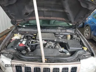 2001 Jeep Grand Cherokee Limited with VIN 1J4GW58N51C581743, listed as a IAAI auction lot 41768215 with 195,862 mi miles. Bid and sale history available at carsss.com. Image 10.