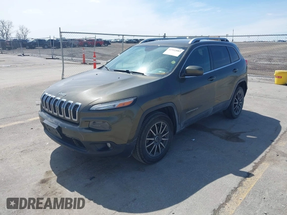 2015 Jeep Cherokee North with VIN 1C4PJMCS9FW588826, listed as a IAAI auction lot 41952883 with 145,586 mi miles. Bid and sale history available at carsss.com. Image 2.