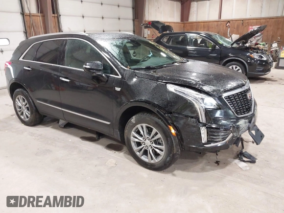 2022 Cadillac XT5 AWD Premium Luxury with VIN 1GYKNDRS8NZ163725, listed as a IAAI auction lot 42295528 with 45,614 mi miles and . Bid and sale history available at DreamBid. Image 1.