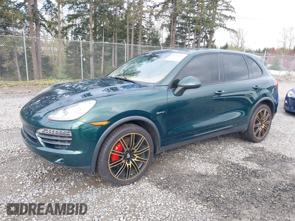 2012 Porsche Cayenne S Hybrid z VIN WP1AE2A20CLA92813, wystawiony jako IAAI lot #41916936 z przebiegiem 145 503 mil mil oraz . Historia ofert i sprzedaży dostępna na DreamBid. Obrazek 2.