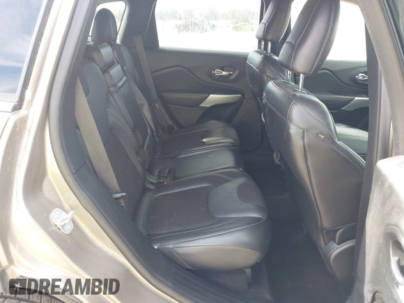 2018 Jeep Cherokee Latitude Plus with VIN 1C4PJMLXXJD571713, listed as a IAAI auction lot 41771661 with 87,580 mi miles and . Bid and sale history available at DreamBid. Image 8.