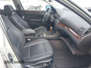 2005 BMW 3 Series 325i with VIN WBAAZ33485KP91350, listed as a IAAI auction lot 41536220 with 153,894 mi miles and . Bid and sale history available at DreamBid. Image 5.
