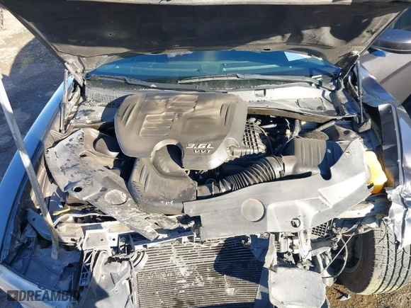 2014 Dodge Charger SXT with VIN 2C3CDXHG7EH325117, listed as a IAAI auction lot 41482634 with 106,761 mi miles. Bid and sale history available at carsss.com. Image 10.