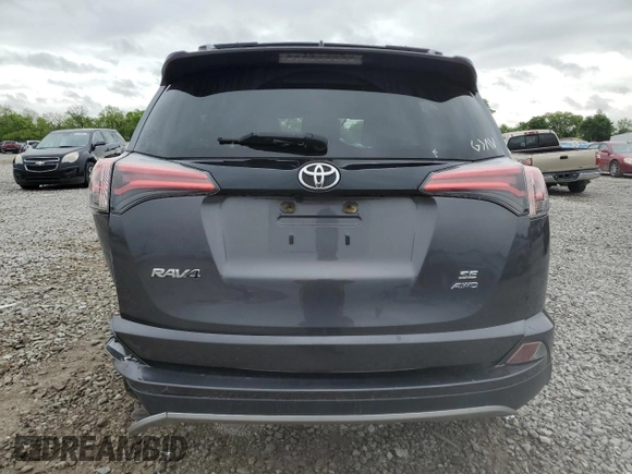 2018 Toyota RAV4 SE with VIN JTMJFREV2JJ730077, listed as a Copart auction lot 56666055 with 85,100 mi miles and Salvage title. Bid and sale history available at DreamBid. Image 6.