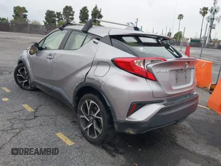 2019 Toyota C-HR XLE with VIN JTNKHMBX8K1046347, listed as a IAAI auction lot 41778368 with 49,918 mi miles and . Bid and sale history available at DreamBid. Image 3.