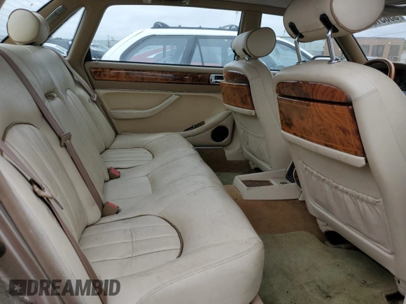 1997 Jaguar XJ Vanden Plas with VIN SAJKX6245VC800386, listed as a Copart auction lot 53651675 with 158,185 mi miles and Salvage Title. Bid and sale history available at DreamBid. Image 10.