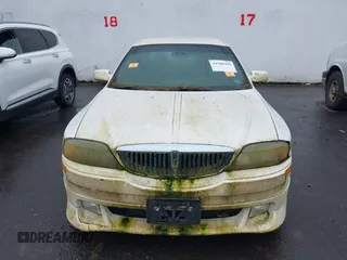 2000 Lincoln LS with VIN 1LNHM87A5YY873918, listed as a IAAI auction lot 41988309 with 1 mi miles. Bid and sale history available at carsss.com. Image 6.
