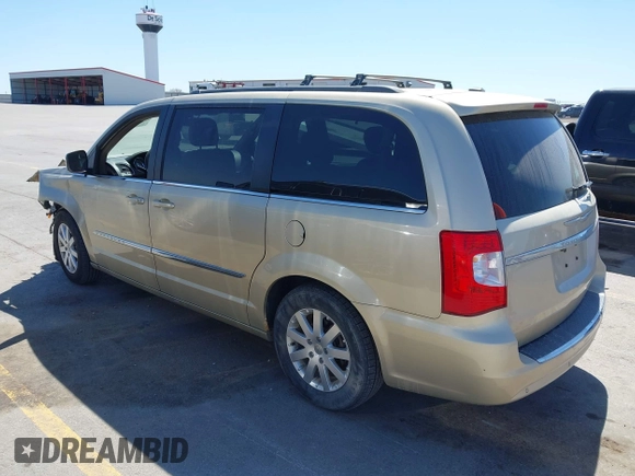2011 Chrysler Town & Country Touring L with VIN 2A4RR8DG6BR781922, listed as a IAAI auction lot 42042313 with 155,612 mi miles and . Bid and sale history available at carsss.com. Image 3.