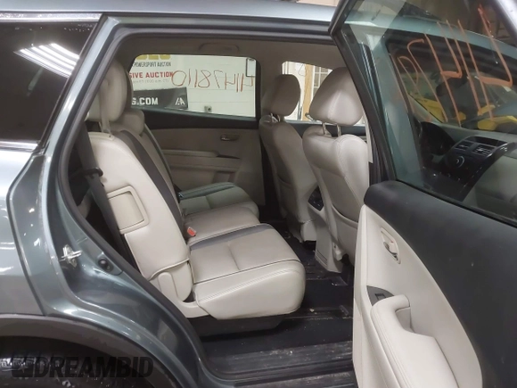 2012 Mazda CX-9 Touring z VIN JM3TB3CV8C0358099, wystawiony jako IAAI lot #41478110 z przebiegiem 151 716 mil mil oraz . Historia ofert i sprzedaży dostępna na DreamBid. Obrazek 8.