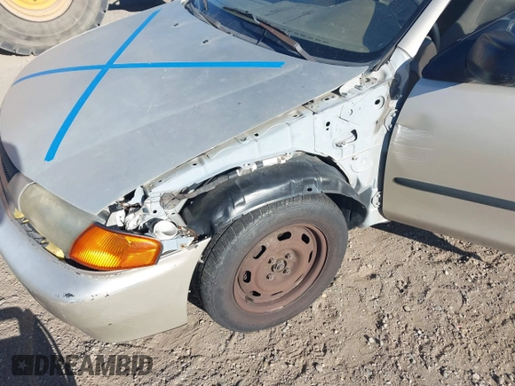 1997 Mazda Protege DX with VIN JM1BC1412V0155780, listed as a IAAI auction lot 42134286 with Not Provided miles and . Bid and sale history available at DreamBid. Image 6.