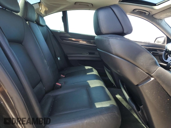 2012 BMW 7 Series 740i with VIN WBAKA4C58CC613763, listed as a Copart auction lot 43557415 with 0 mi miles and Salvage Title. Bid and sale history available at carsss.com. Image 10.
