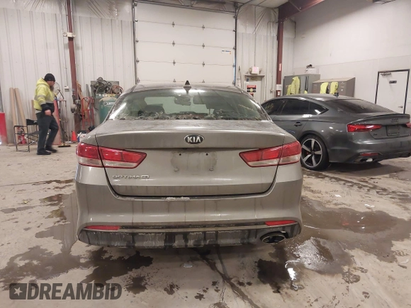 2017 Kia Optima LX with VIN 5XXGT4L33HG148897, listed as a IAAI auction lot 41565592 with 61,471 mi miles and . Bid and sale history available at carsss.com. Image 17.