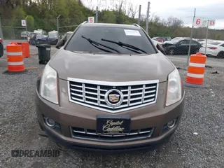 2014 Cadillac SRX Performance Collection with VIN 3GYFNCE33ES570472, listed as a IAAI auction lot 41971511 with 200,811 mi miles. Bid and sale history available at carsss.com. Image 12.