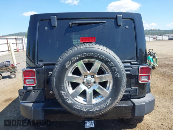 2016 Jeep Wrangler Unlimited Sahara with VIN 1C4BJWEG7GL250357, listed as a IAAI auction lot 42665881 with 102,168 mi miles and . Bid and sale history available at DreamBid. Image 17.