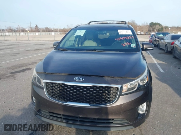 2016 Kia Sedona EX with VIN KNDMC5C1XG6159271, listed as a IAAI auction lot 41409277 with 95,696 mi miles. Bid and sale history available at carsss.com. Image 12.