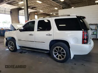 2012 GMC Yukon Denali with VIN 1GKS2EEF3CR140772, listed as a Copart auction lot 69621614 with 207,425 mi miles and Salvage Title. Bid and sale history available at carsss.com. Image 2.