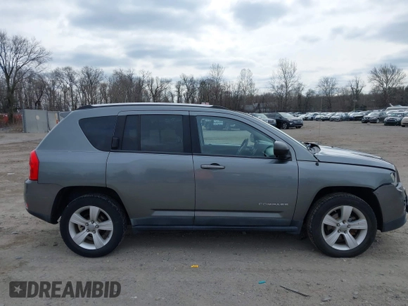 2011 Jeep Compass with VIN 1J4NF1FB1BD251618, listed as a IAAI auction lot 41633368 with 125,326 mi miles. Bid and sale history available at carsss.com. Image 13.