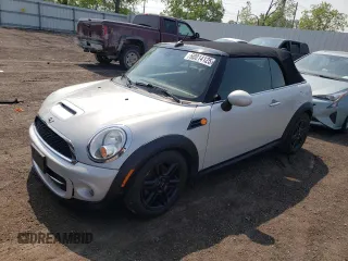 2014 MINI Convertible z VIN WMWZN3C55ET861050, wystawiony jako Copart lot #60014125 z przebiegiem 101 524 mil mil oraz Czysty tytuł • Clean title. Historia ofert i sprzedaży dostępna na DreamBid. Obrazek 1.